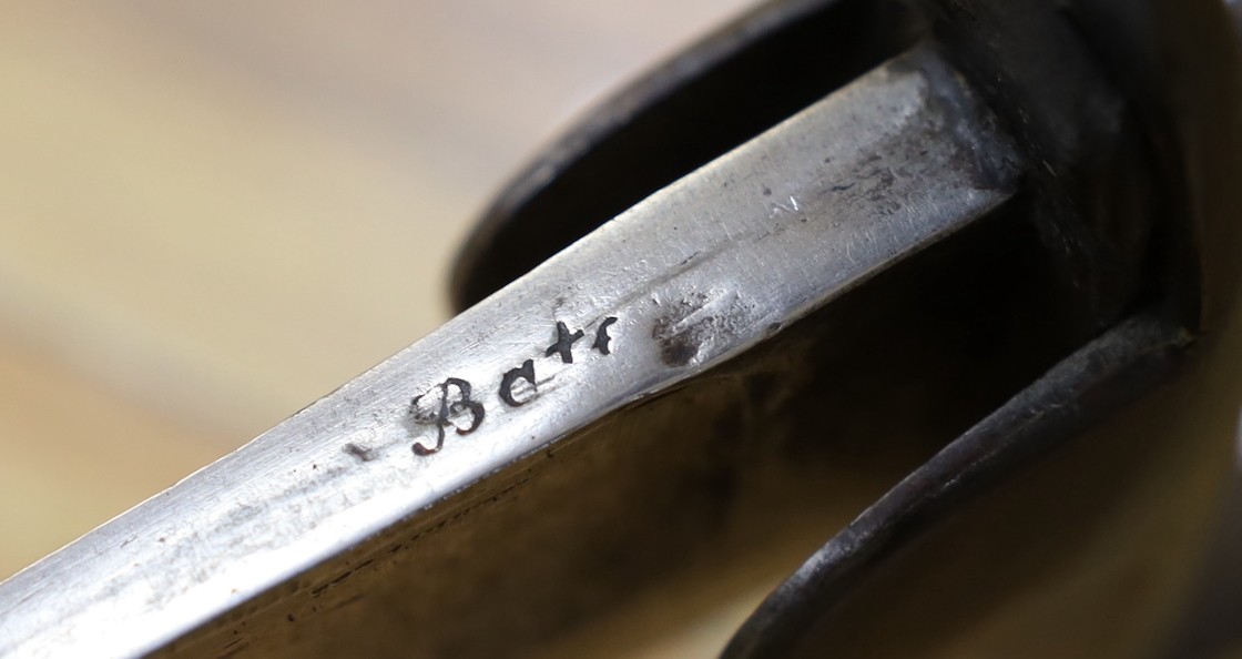 A British pattern 1796 light cavalry sabre, ‘W.S.R.’ engraved to hilt and ‘Bats’? to spine, with steel scabbard. 99cm total length